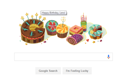Google says  "Happy Birthday Lens Eye"