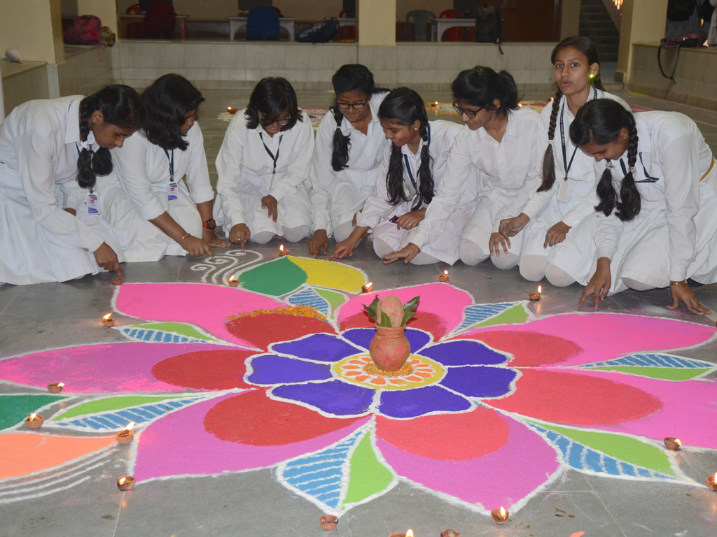 Diwali celebration and Inter House Rangoli making competition at Oxford