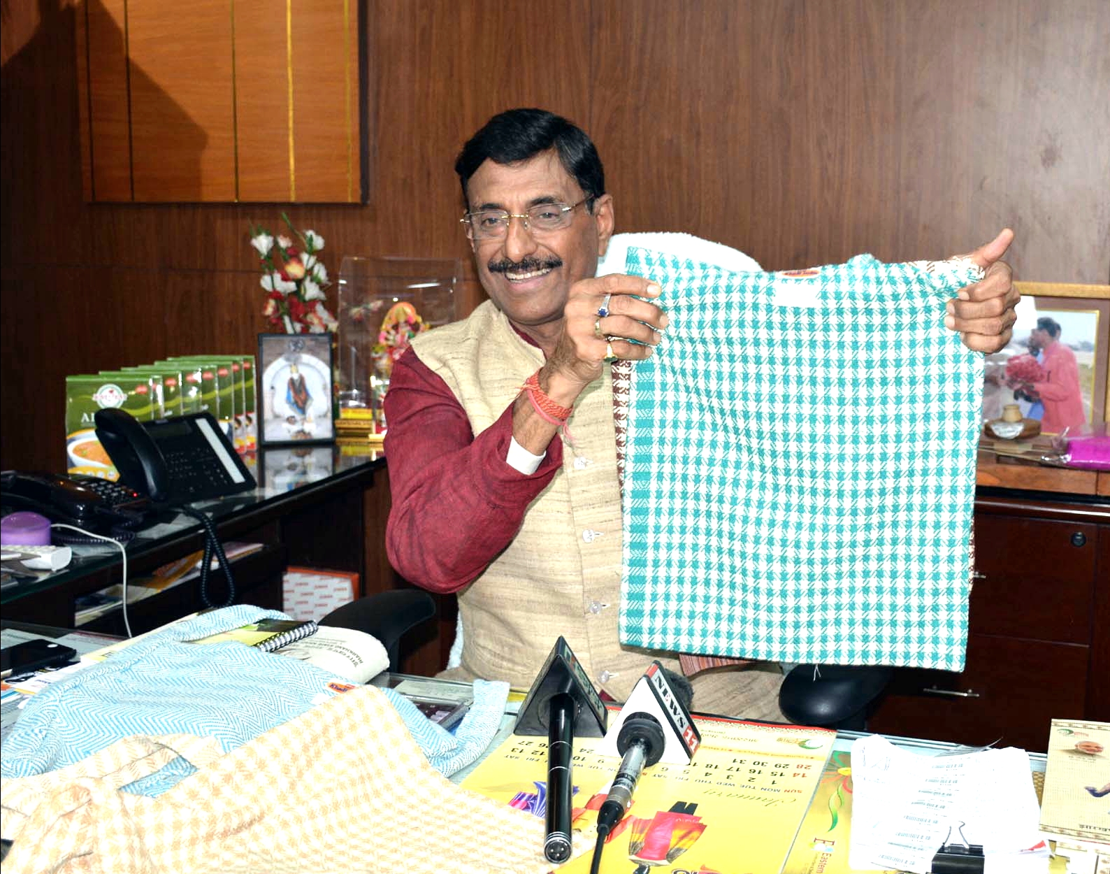 Jharkhand Khadi and Village Industries Board chairman Sanjay Seth launches the newly made Cloth bags